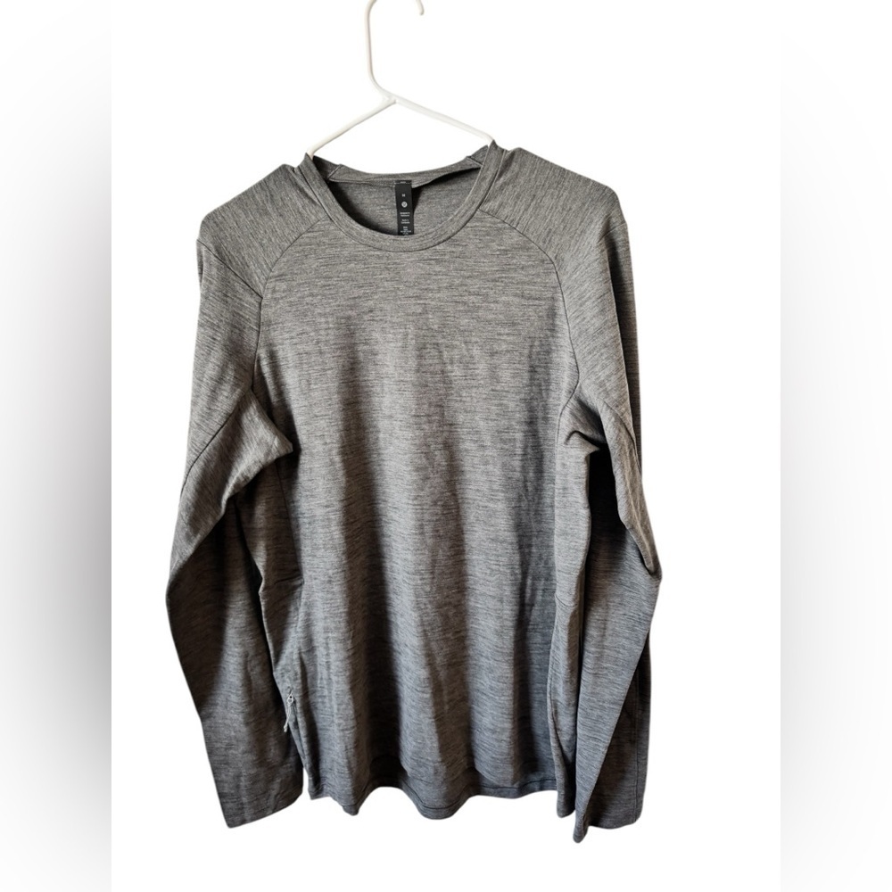 Lululemon Surge Warm Long Sleeve Shirt with thumb holes and zip pocket